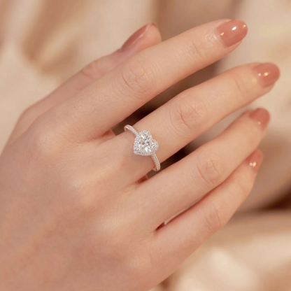 Heart Halo Ring on hand: heart halo ring with central stone, slim pavé band