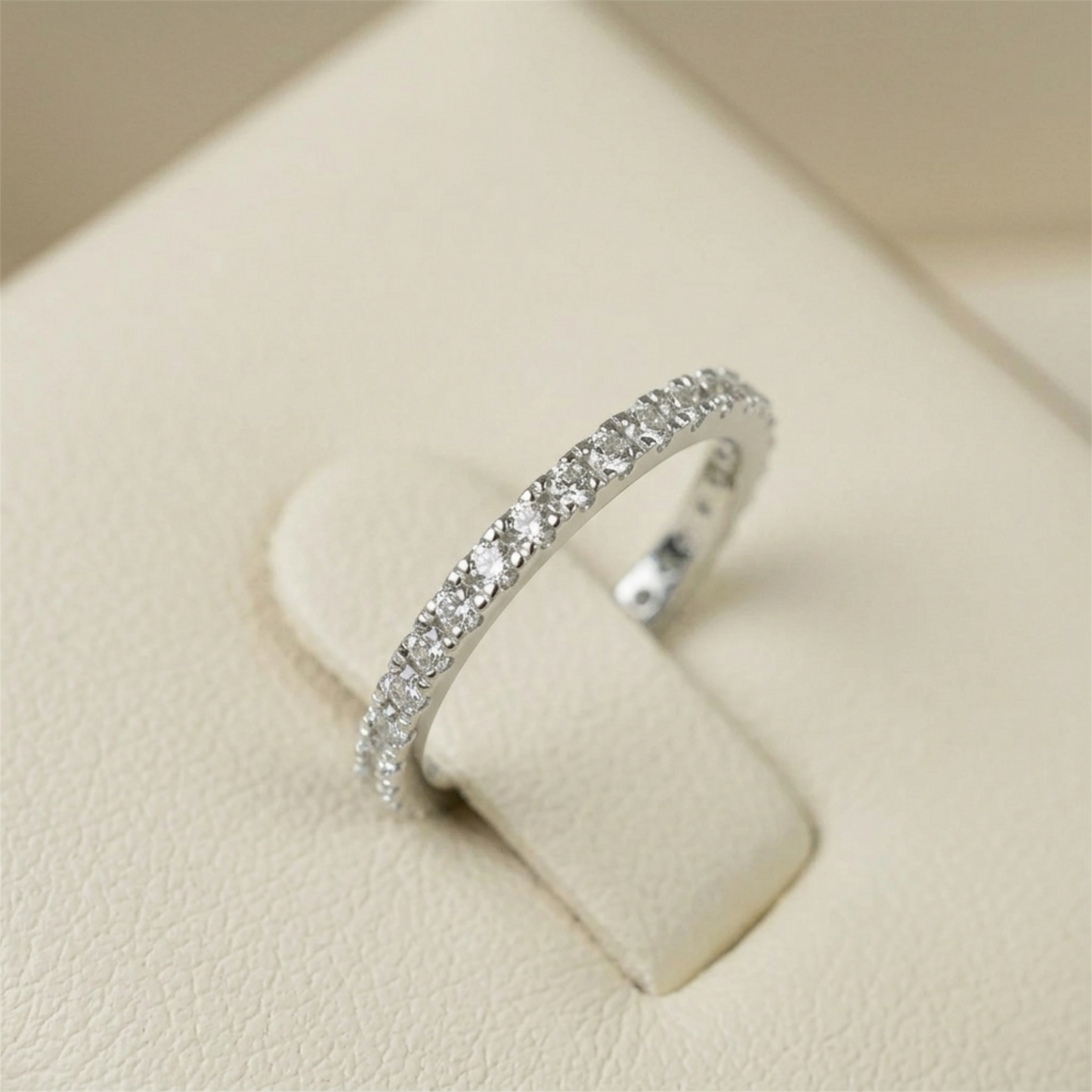 Rhodium CZ eternity band with full pavé stone row around the outer edge