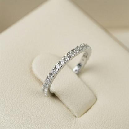 Rhodium CZ eternity band with full pavé stone row around the outer edge