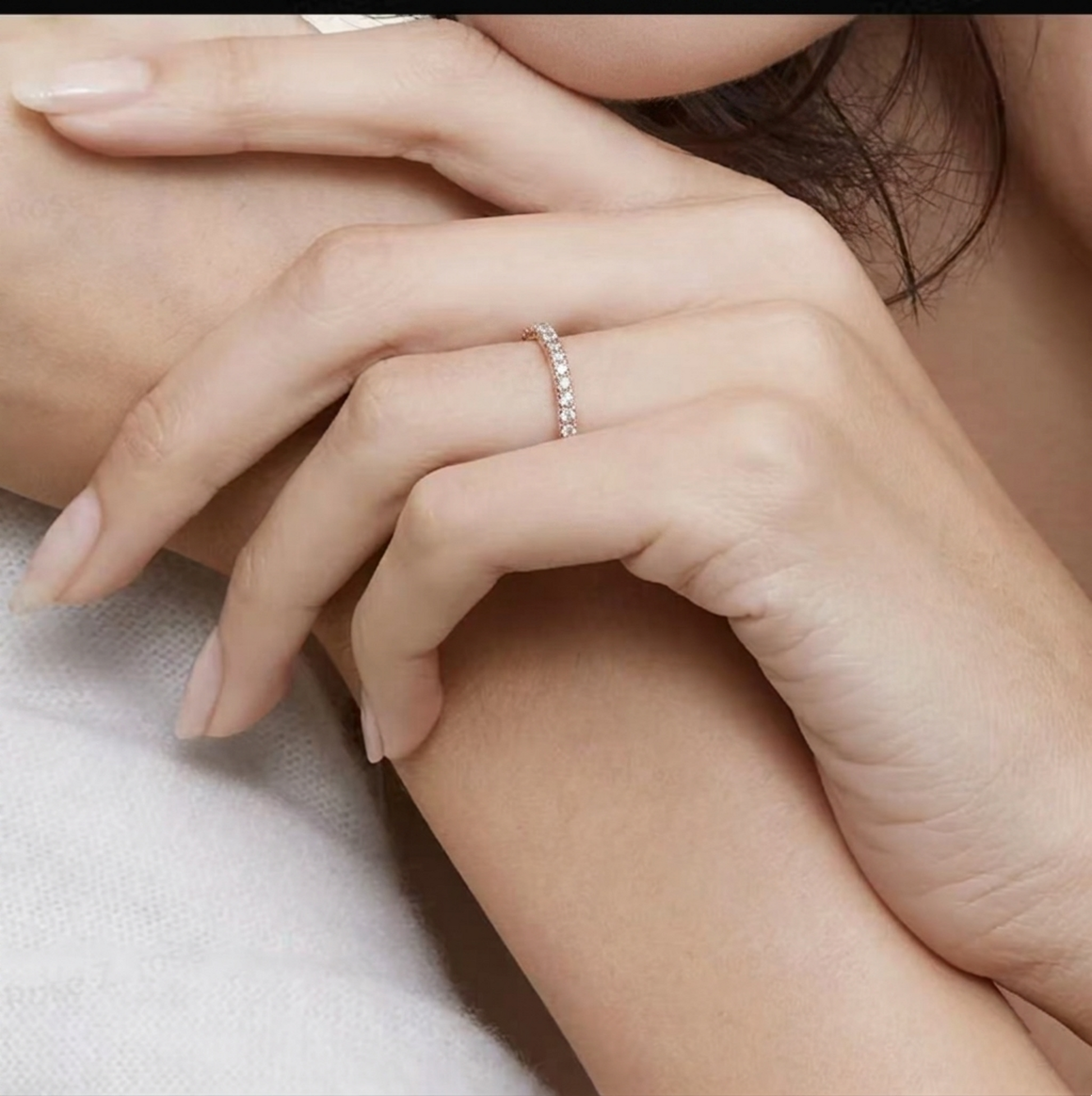 CZ Stacking Eternity Band in rhodium tone with sparkling stones, worn on finger