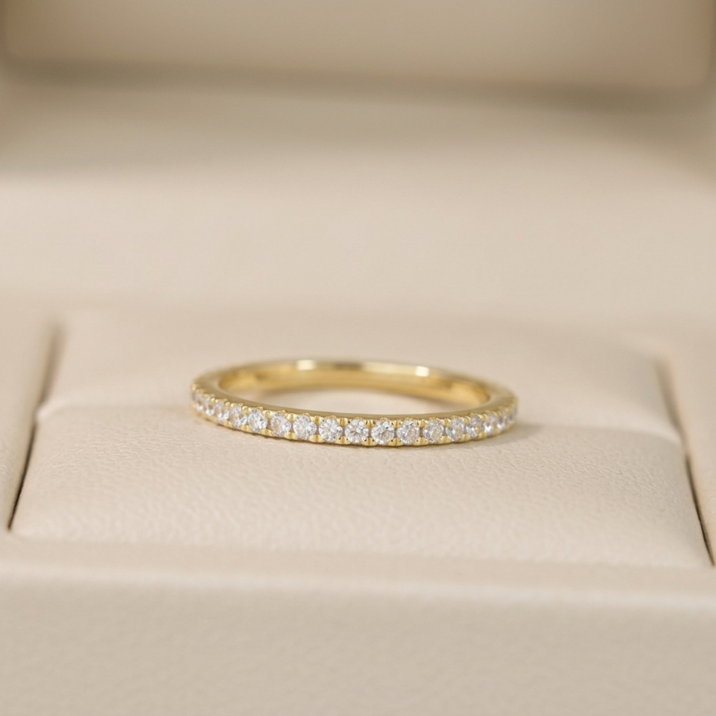 Gold CZ eternity band with pavé stones, smooth round top surface