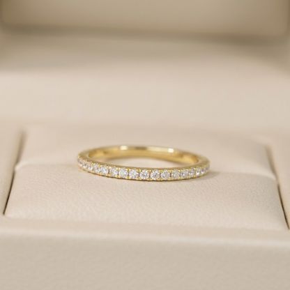 Gold CZ eternity band with pavé stones, smooth round top surface