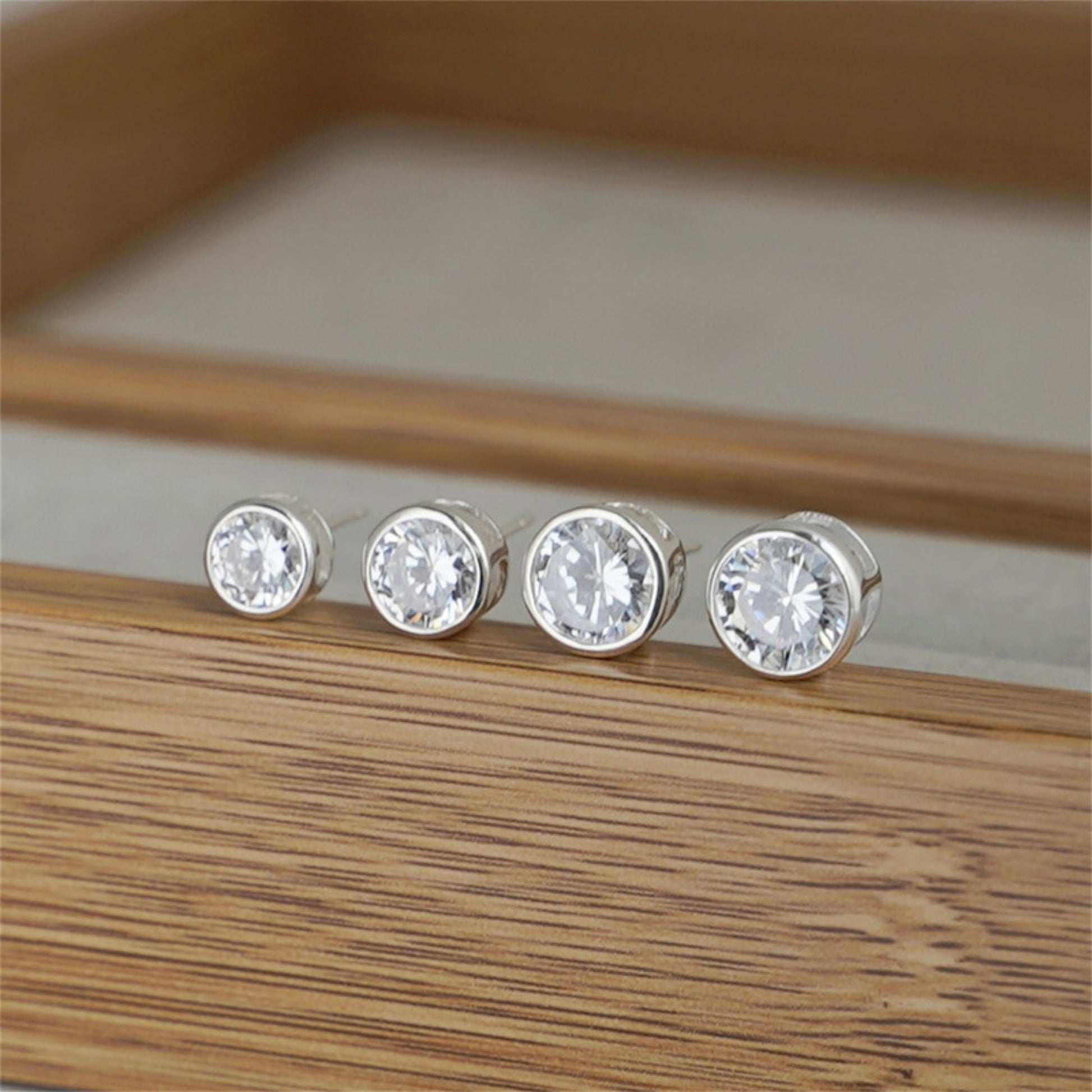 925 Sterling Silver CZ Stud Earrings with Round Bezel Setting in Clear or Black - sugarkittenlondon