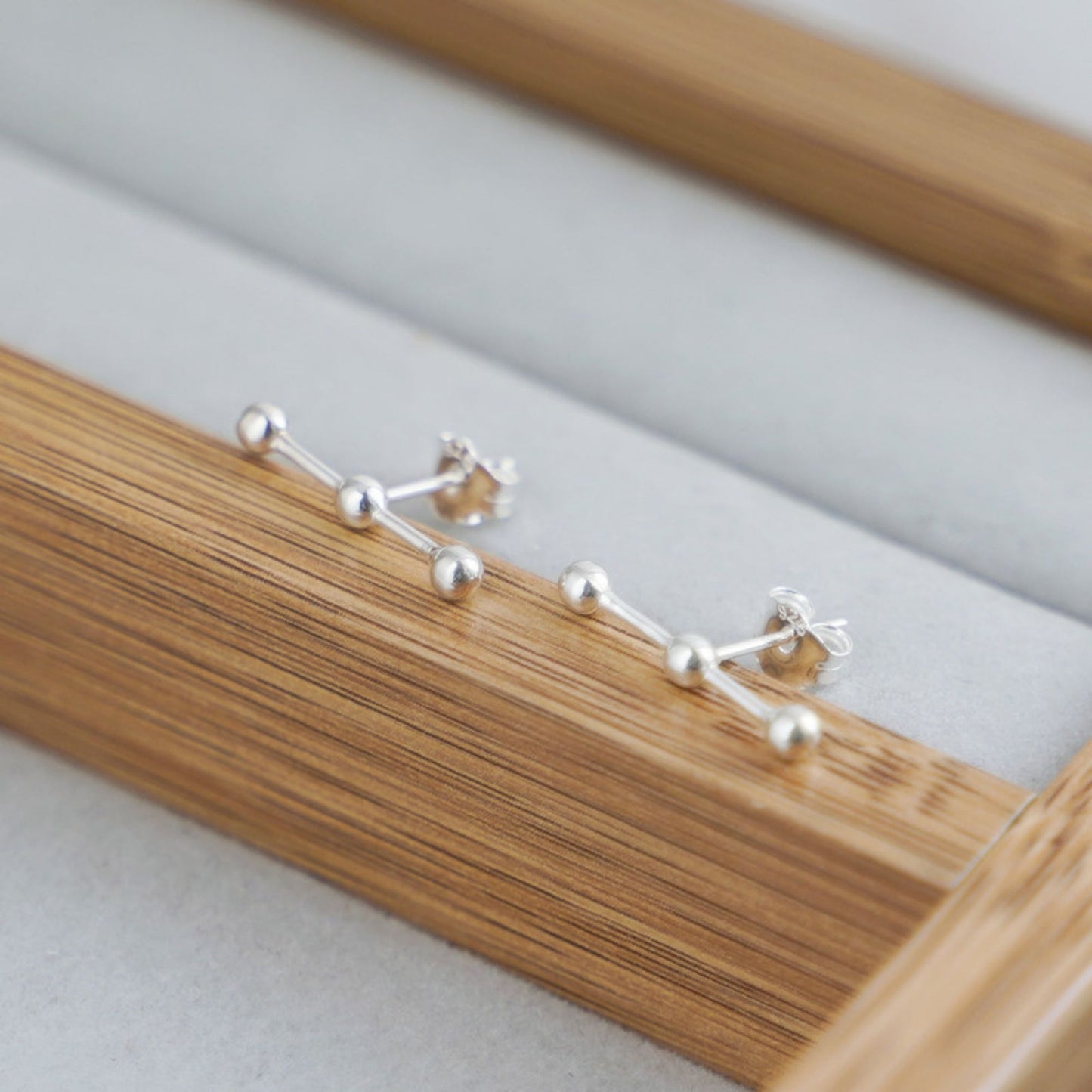 925 Sterling Silver Ball Stud Earrings with Triple Beads and Geometry Line - sugarkittenlondon