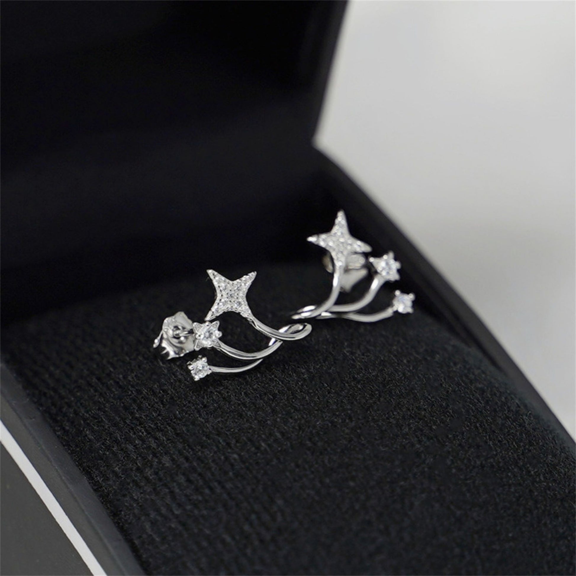 Sterling Silver Triple Shooting Star Polaris CZ Curvy Huggie Stud Earrings - sugarkittenlondon