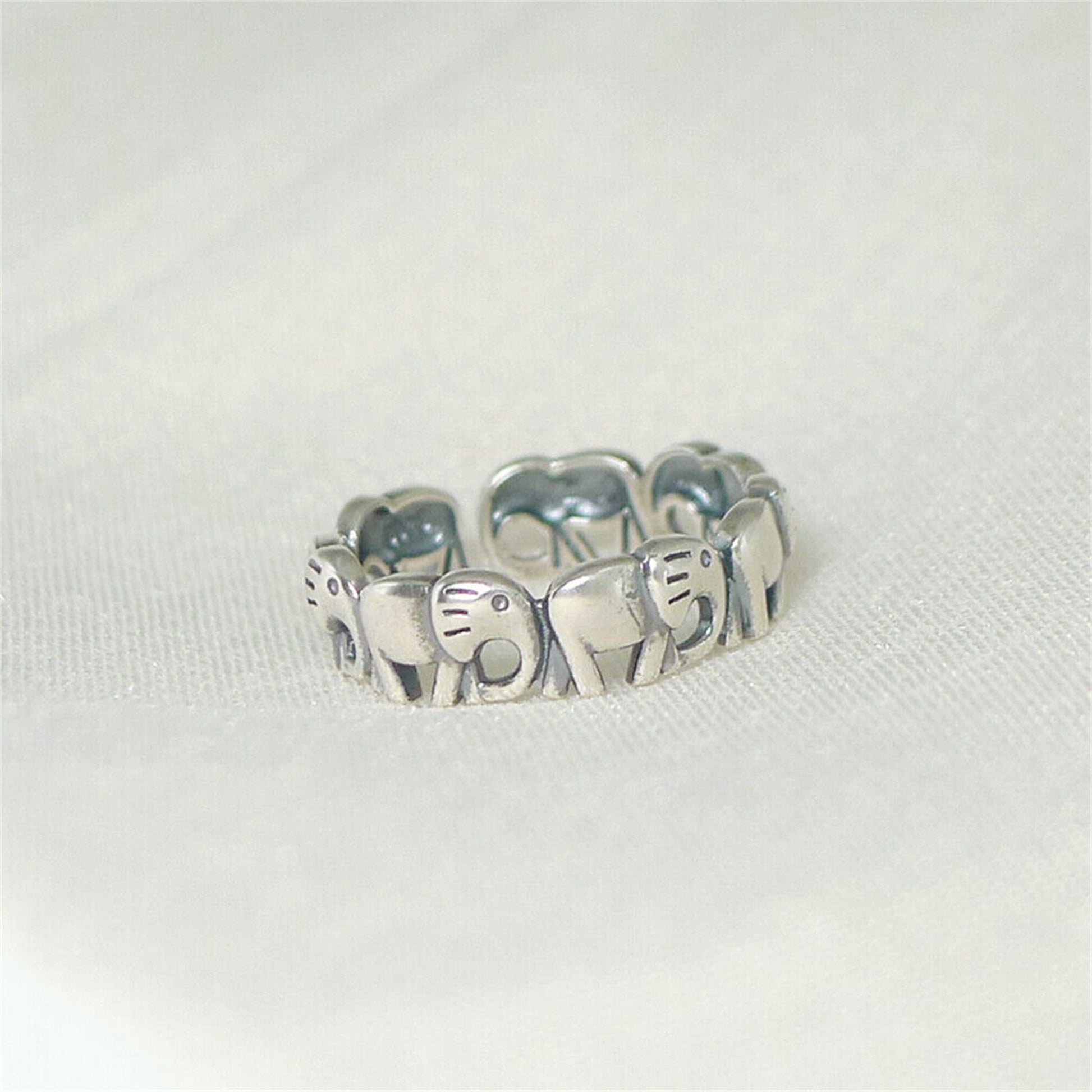 Sterling Silver Elephant Ring with Oxidized Linked Parade Design - sugarkittenlondon