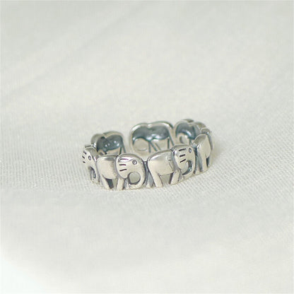 Sterling Silver Elephant Ring with Oxidized Linked Parade Design - sugarkittenlondon
