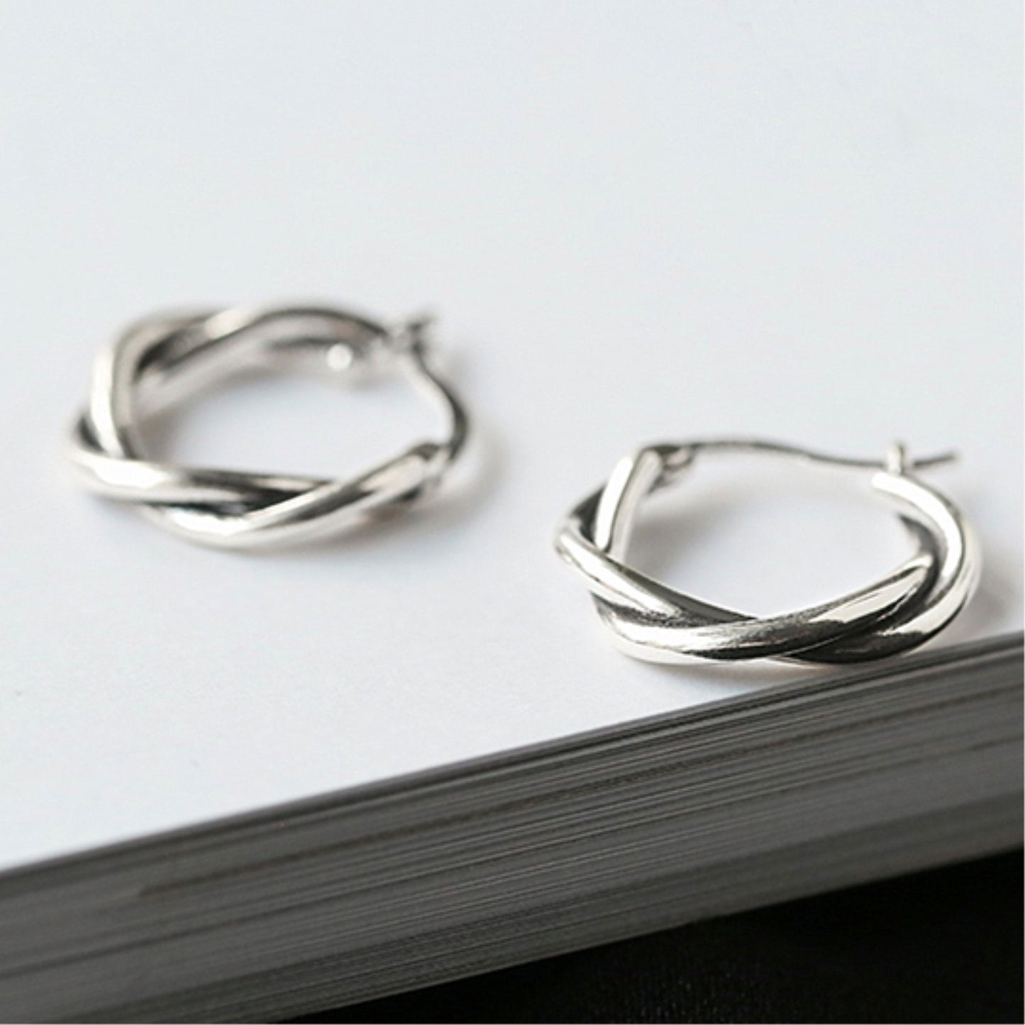 19mm Sterling Silver Oxidized Twist Hoop Earrings with Knot Detail - sugarkittenlondon