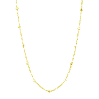 Gold beaded satellite chain necklace, full length with evenly spaced bead links.