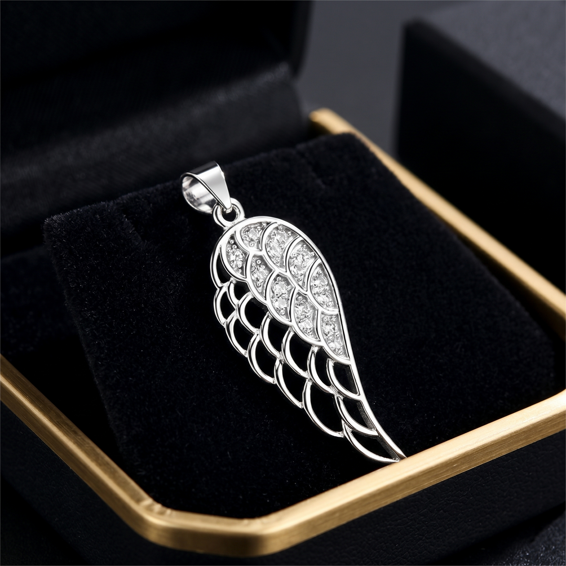 Full pavé single wing pendant in sterling silver tone, sculpted feather design