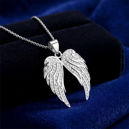 Double angel feather wing pendant with pavé stones on a chain