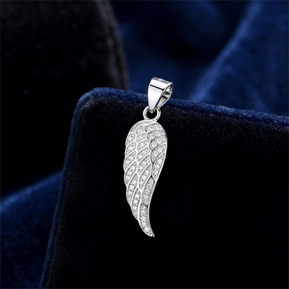 Angel wing pendant close-up, full paved single-wing crystal pattern in silver tone