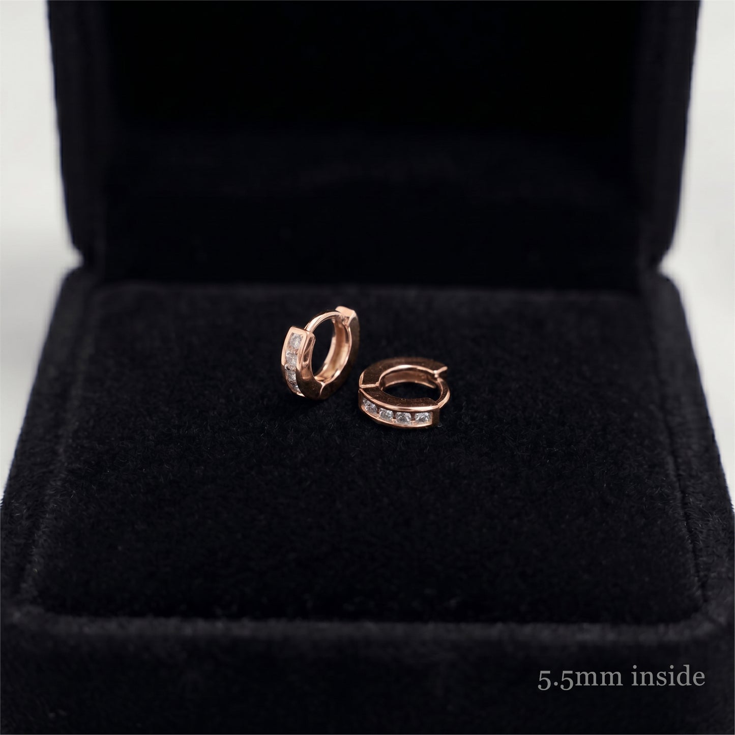 Rose Gold Channel Huggie Hoops inner view with clear stone row