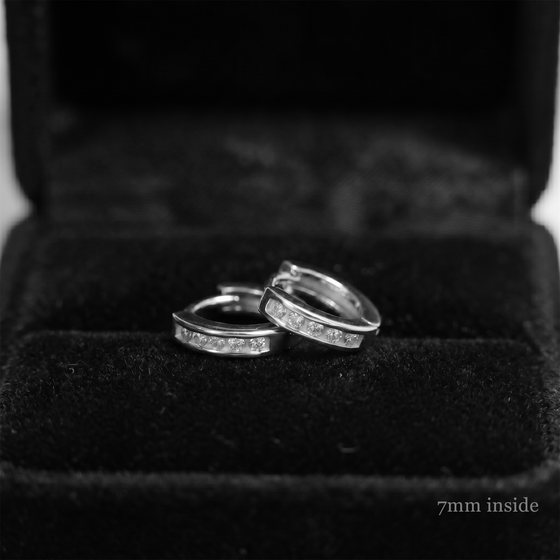 Channel Huggie Hoop earrings, rhodium silver with clear stones; 7mm inside angle
