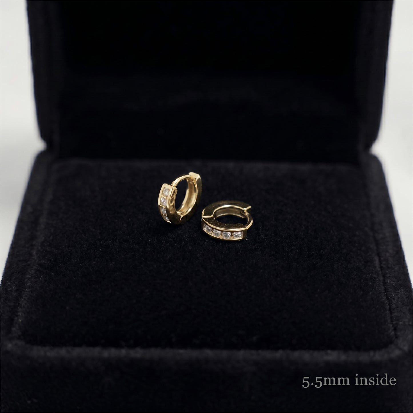 Channel Huggie Hoop earrings, gold tone with clear stones; 5.5mm inside