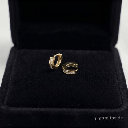 Channel Huggie Hoop earrings, gold tone with clear stones; 5.5mm inside