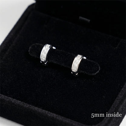 Rhodium Channel Huggie Hoops with small clear stones on the front