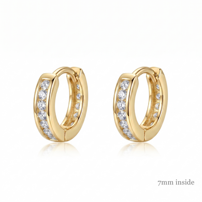 Channel Huggie Hoop earrings, gold tone with clear stone row; 7mm inside