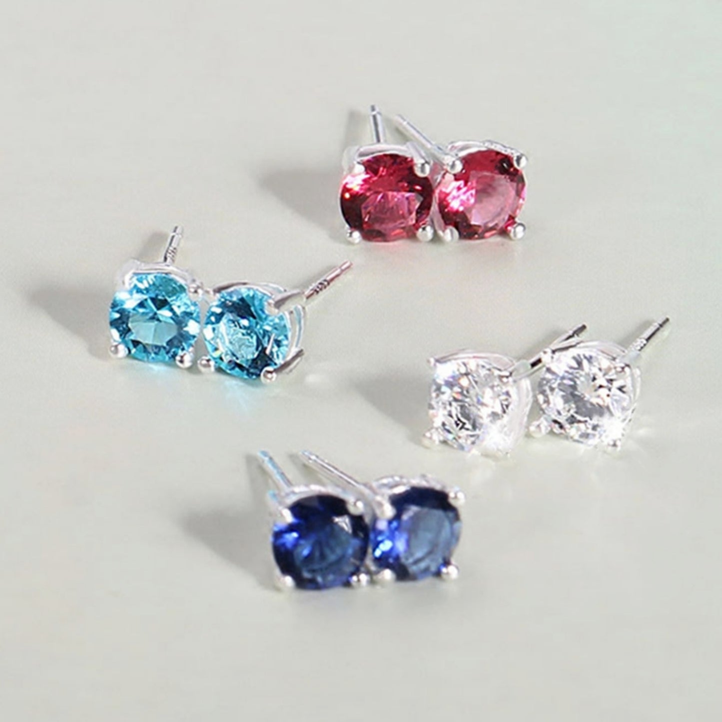 Sterling Silver 4 Claw Round 5mm CZ Stud Earrings 4 Stone Colours Sky Blue/Blue/Ruby/Clear - sugarkittenlondon