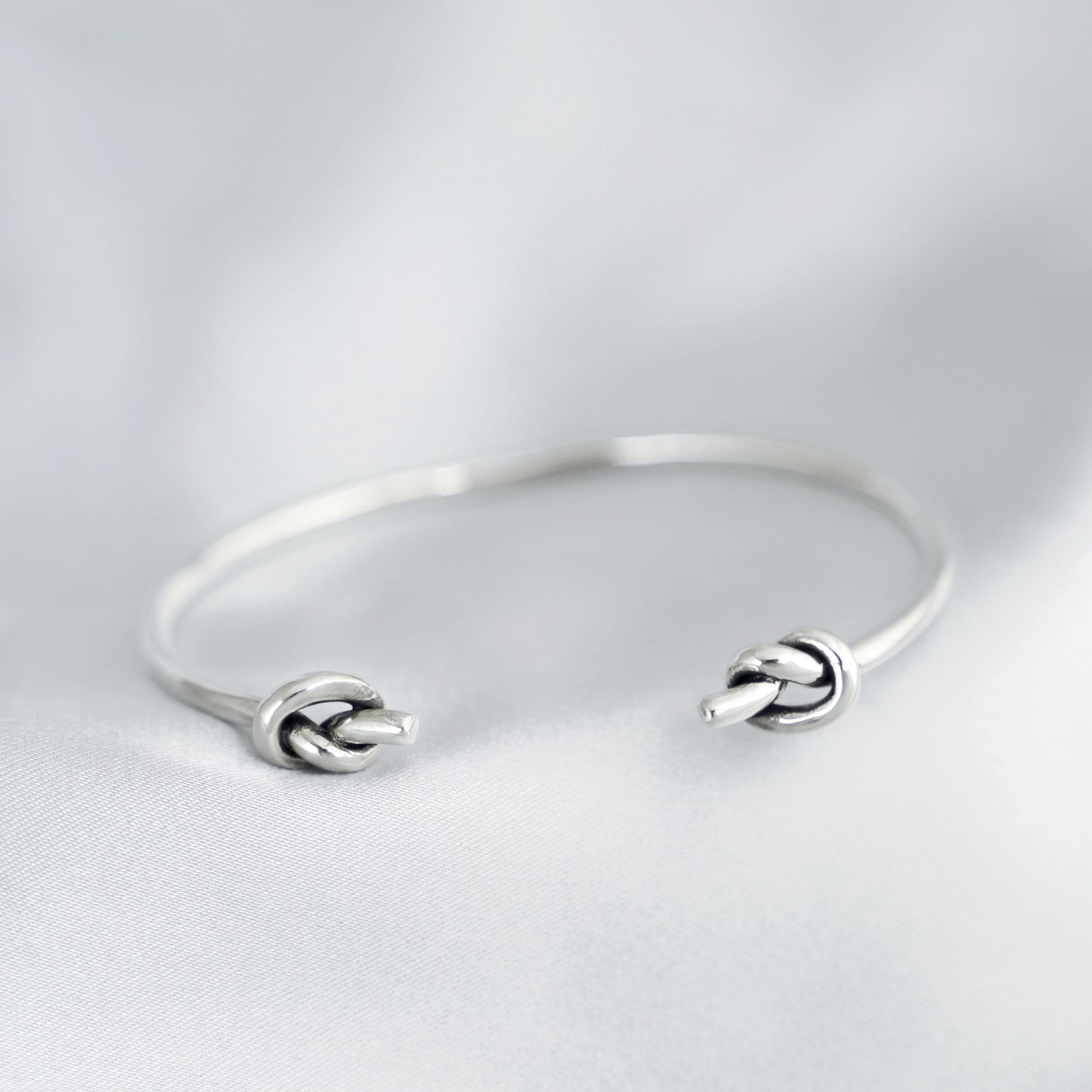 925 Sterling Silver Friendship Knot Bangle with Double Twisted Knots and Heart Design - sugarkittenlondon