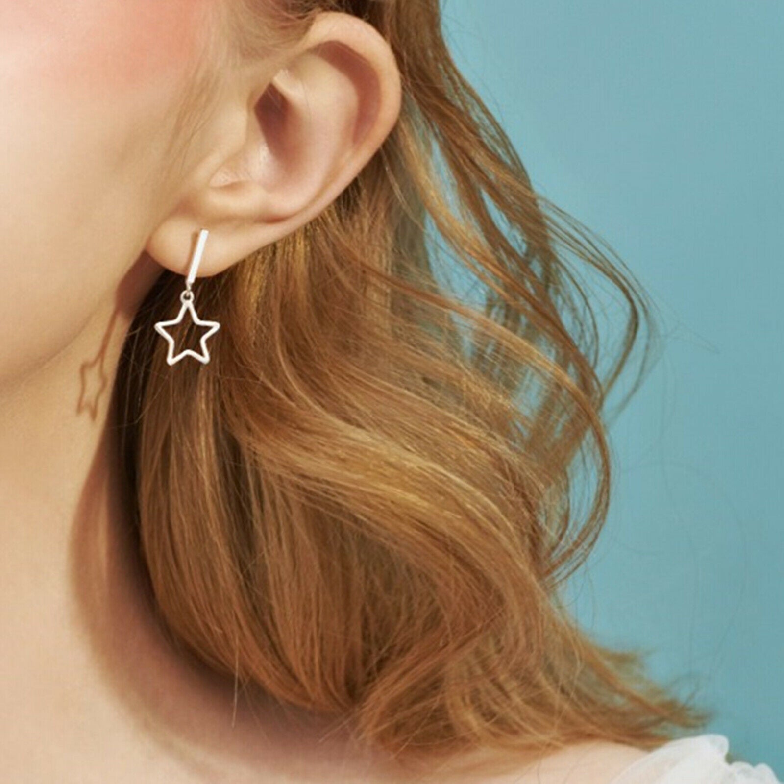 Sterling Silver Hollow Star Moon Bar Post Earrings with Line Drop - sugarkittenlondon