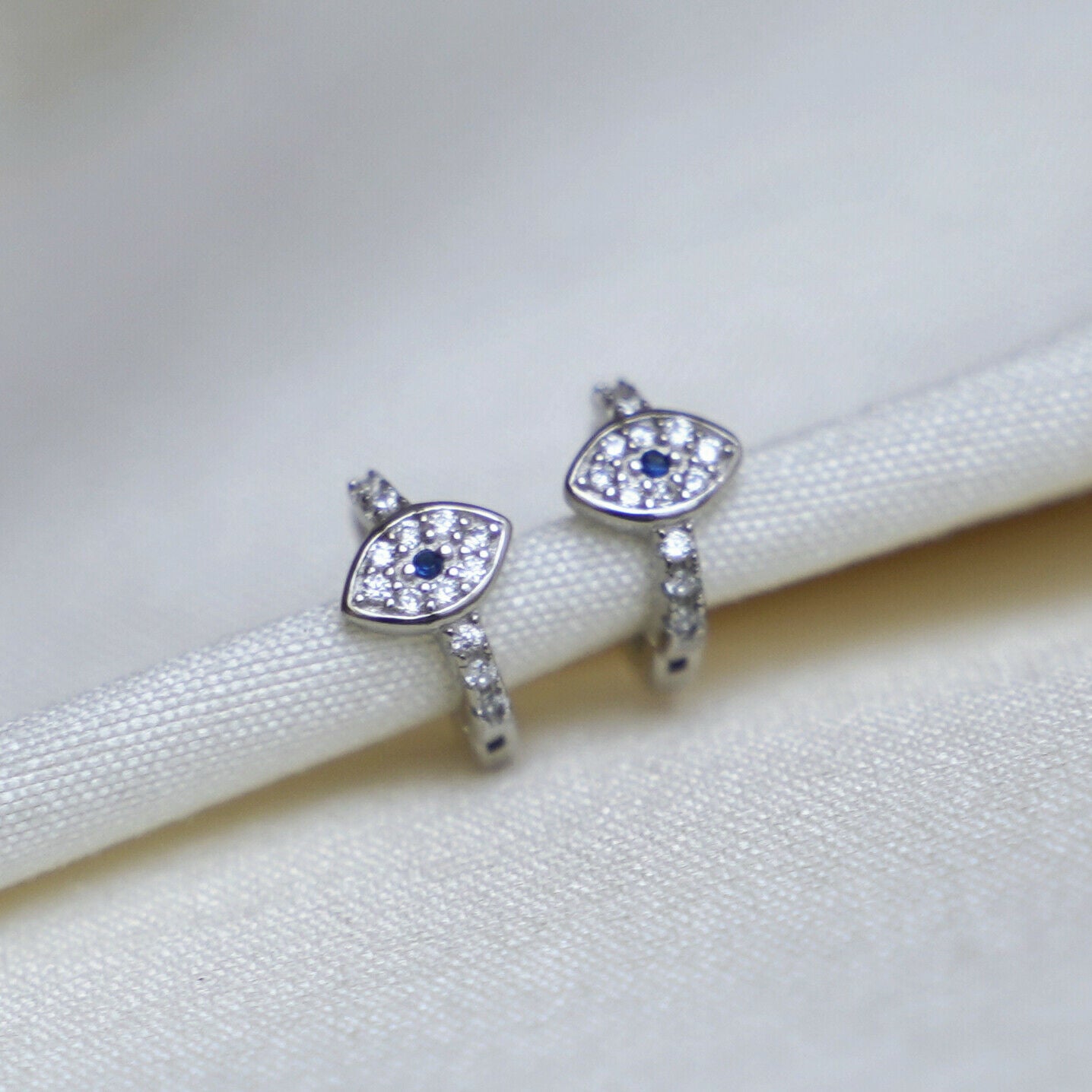 8mm Sterling Silver Evil Eye Hoop Earrings with Blue and White CZ Paving - sugarkittenlondon