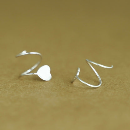 Sterling Silver Heart Twirl Huggie Earrings with Reverse Worn Wire - sugarkittenlondon