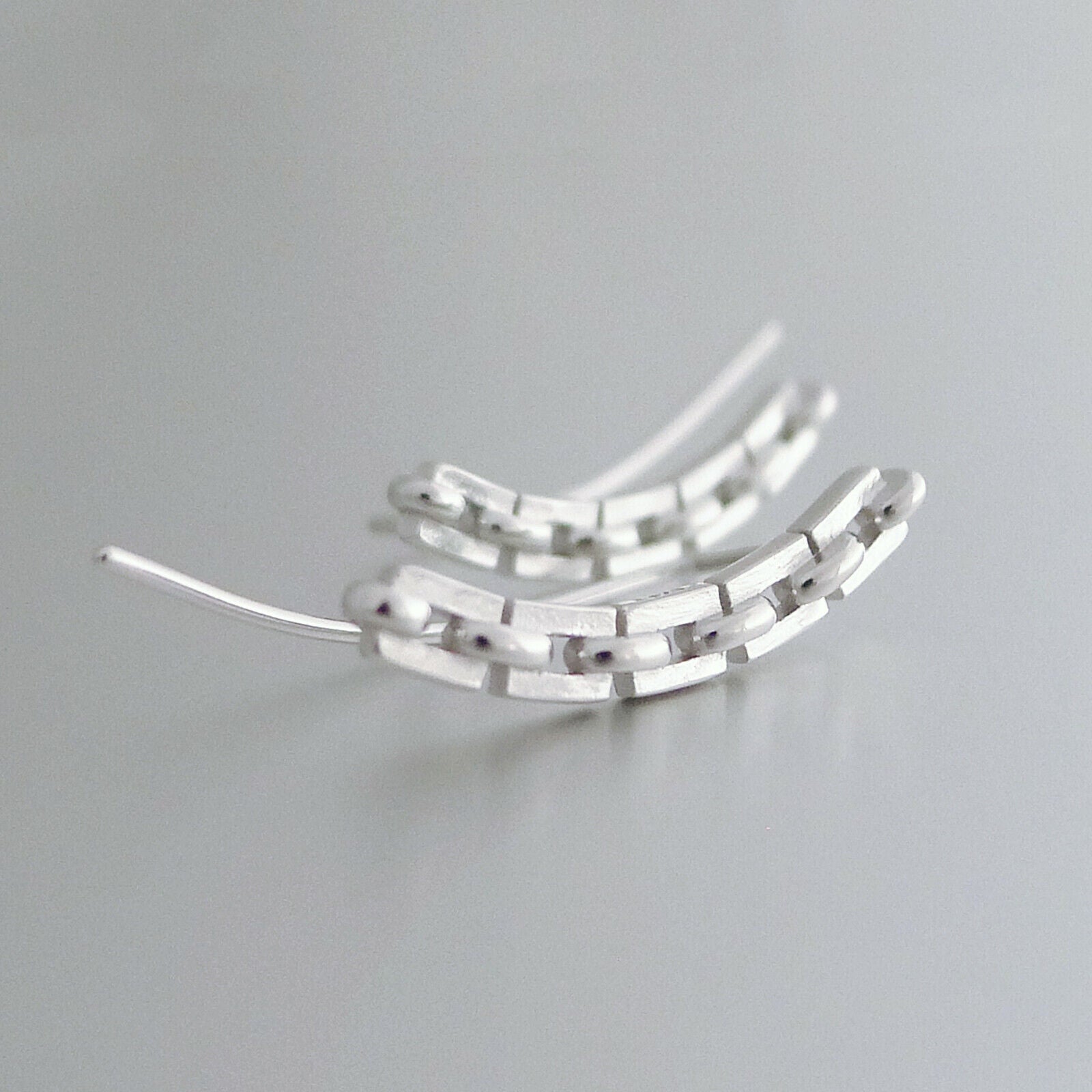 Curved Cube Climber Earrings in Sterling Silver with Linked Chain Geometry - sugarkittenlondon