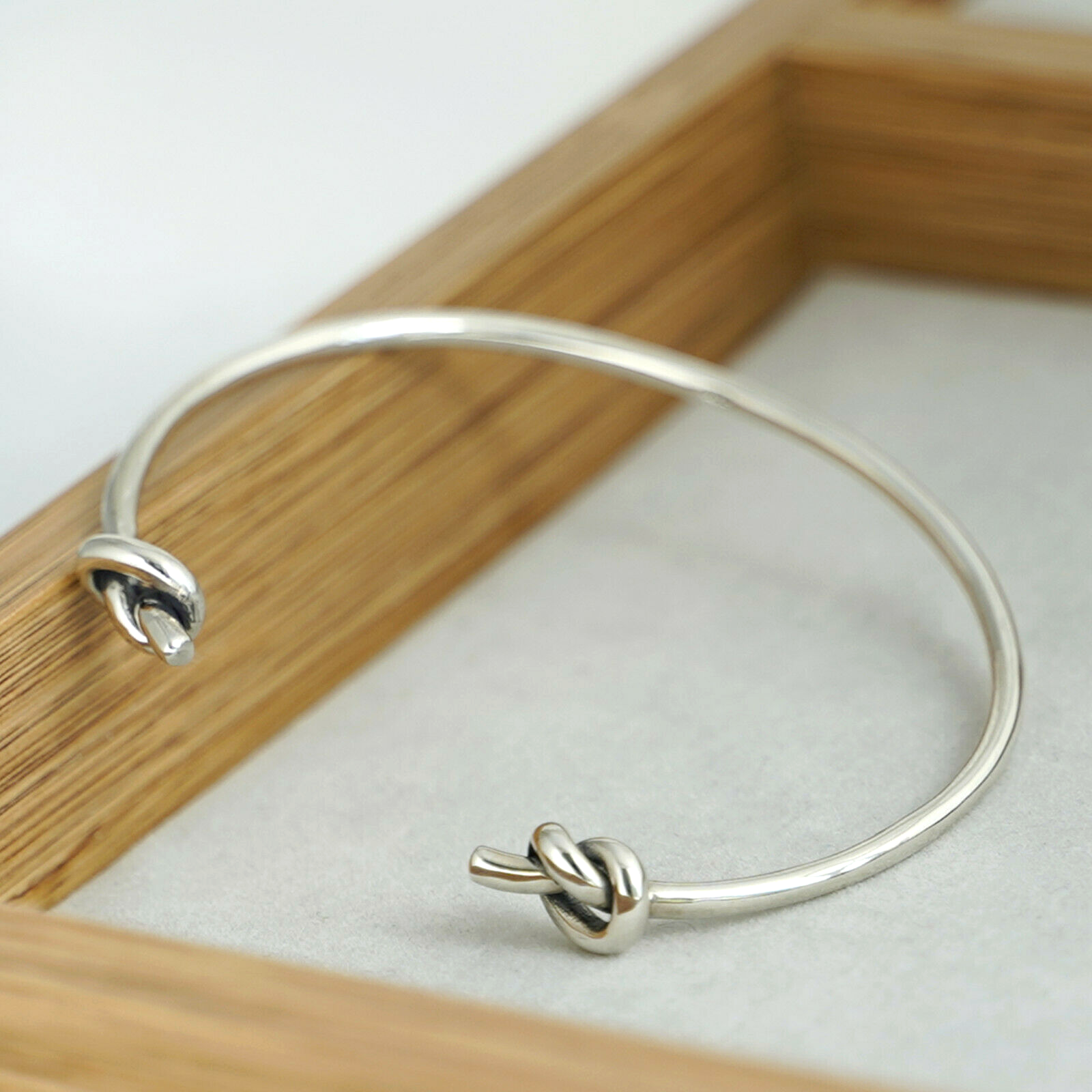 925 Sterling Silver Friendship Knot Bangle with Double Twisted Knots and Heart Design - sugarkittenlondon