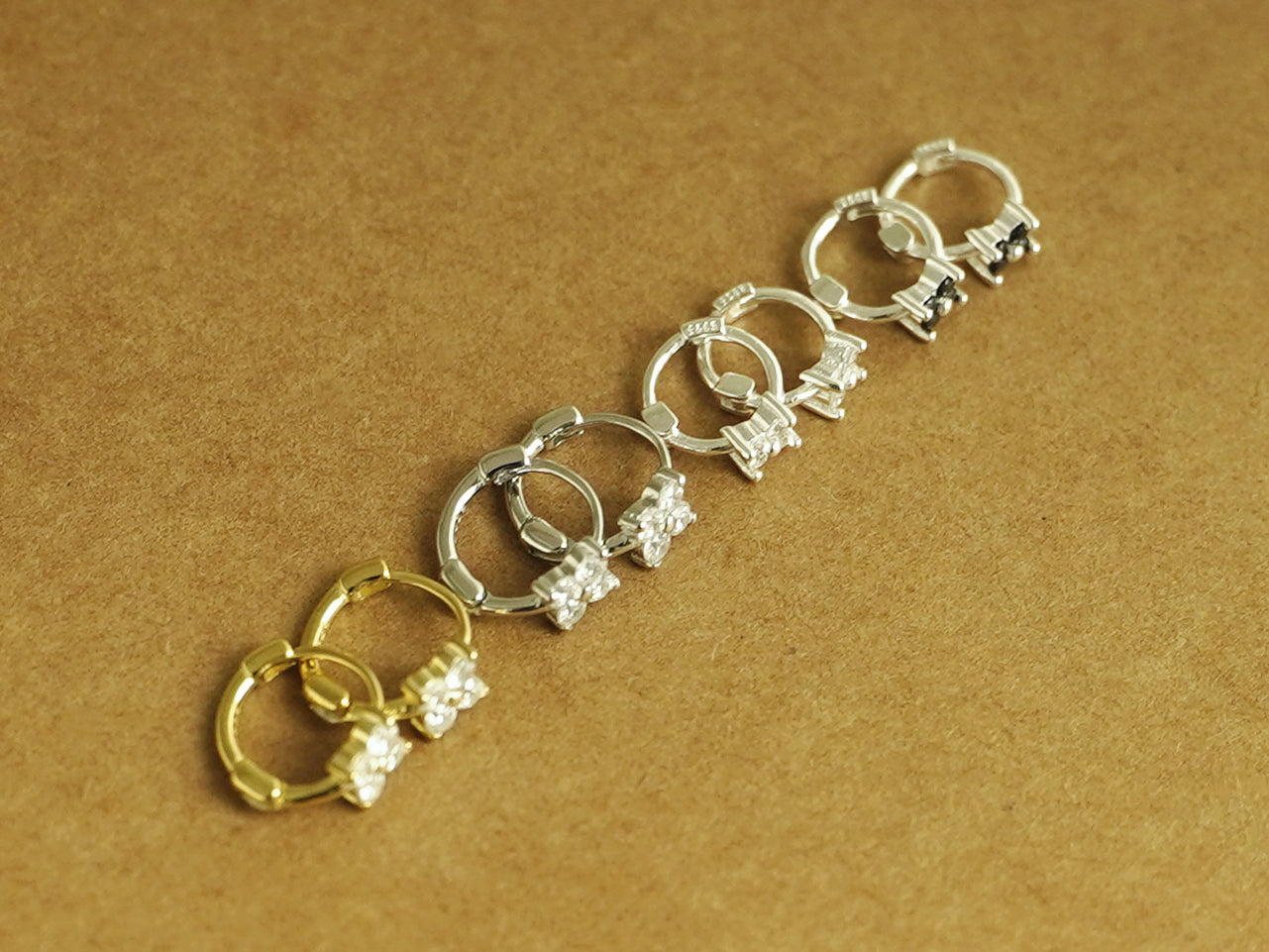 Elegant CZ Flower Huggie Earrings in Sterling Silver with 18K Gold Plating - sugarkittenlondon
