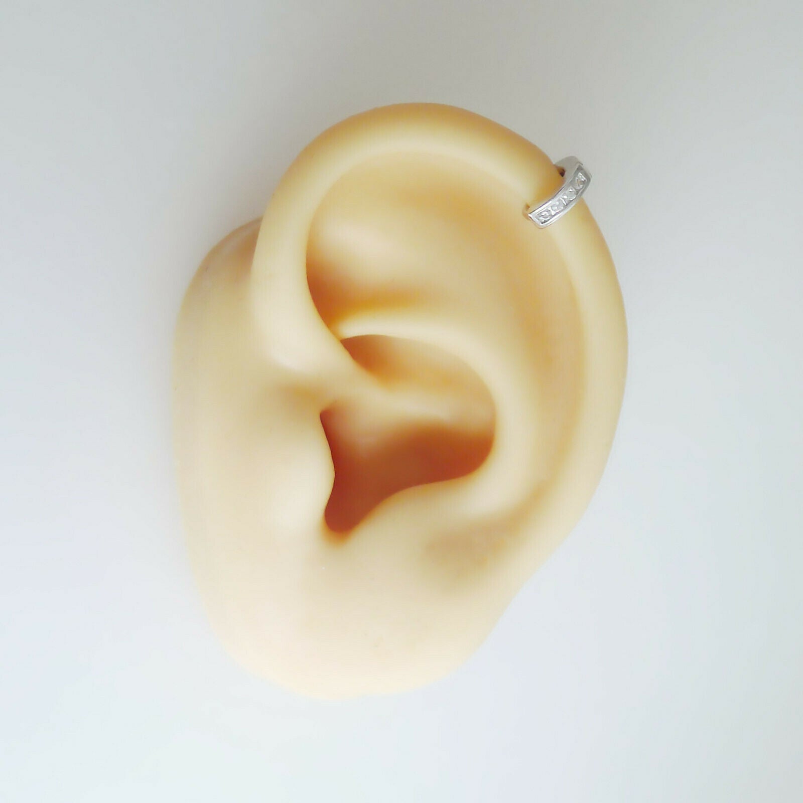 Sterling Silver Channel-Set CZ Huggie Hoop Earrings 5.5mm - sugarkittenlondon